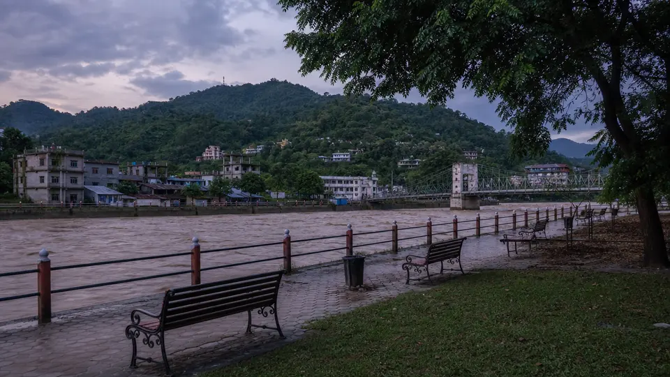 Rescue workers searching through debris along the flooded Trishuli river valley in Nepal, one week after catastrophic flooding devastated the region.