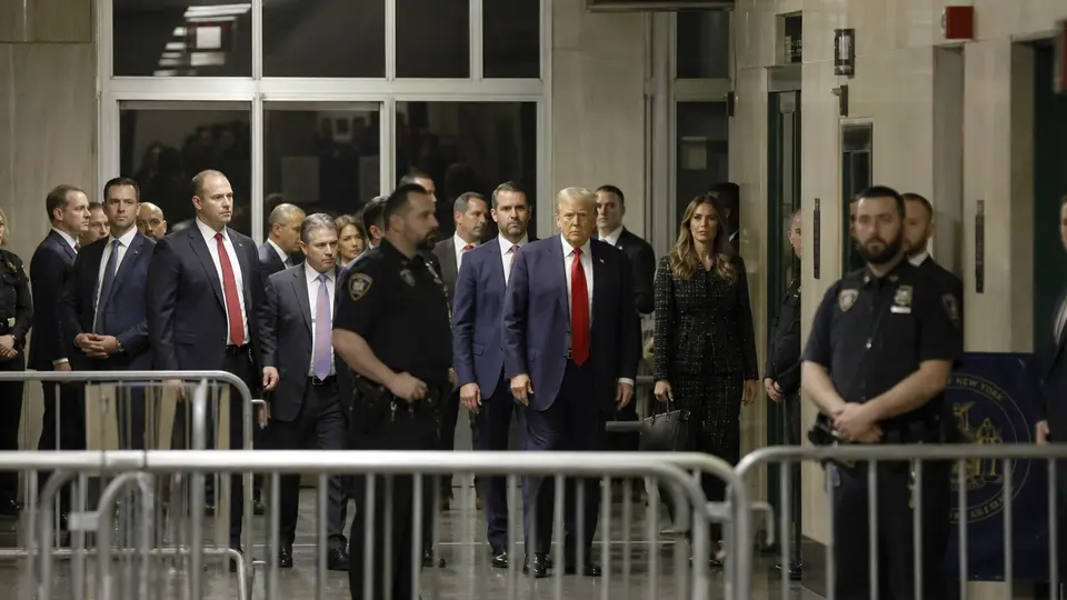 Former US President Donald Trump arriving in Manhattan ahead of his historic criminal arraignment at a New York courthouse.
